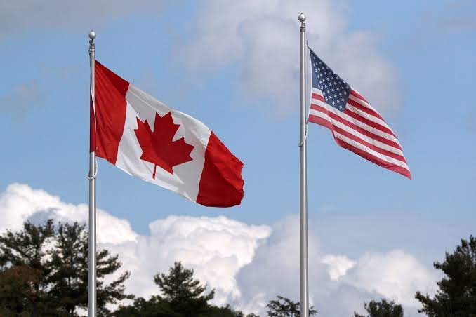 Canadian flag and USA flag